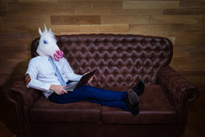 Man with a unicorn mask participating in Hokie Pokie Treatment Program